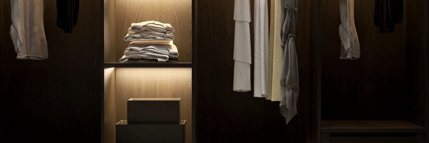 Modern, luxury brown wooden built in, walk in closet wardrobe on carpet floor in bedroom, shelf, drawer, hidden light with organized clothes, storage box for interior design, fashion background 3D
